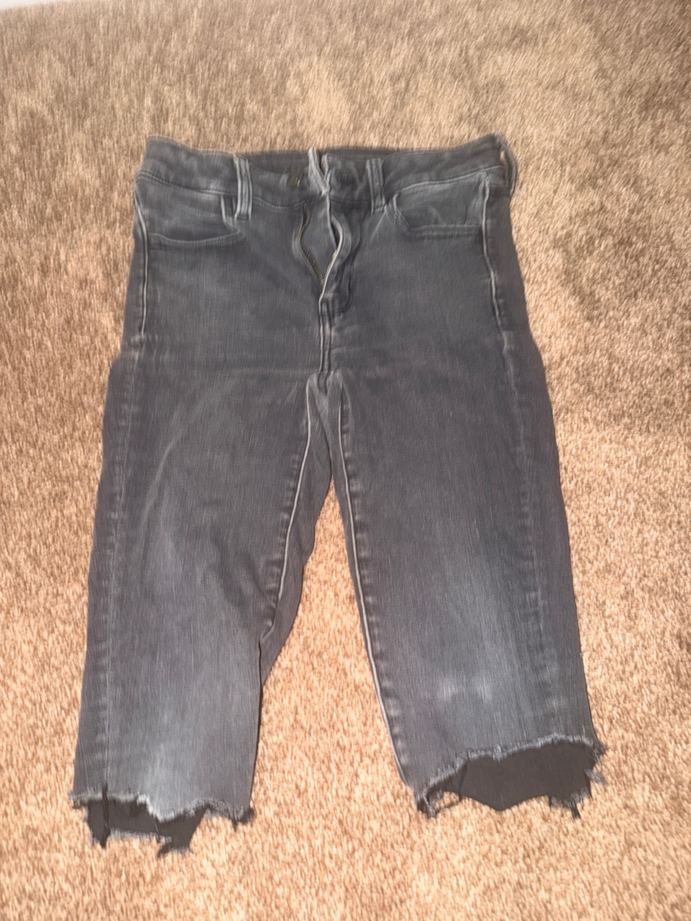 American Eagle Outfitters Black Washed Skinny Jeans with Raw Hem